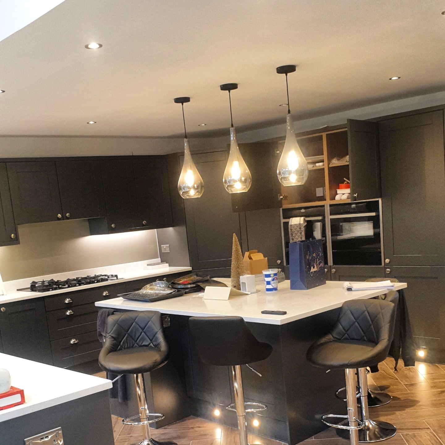 Feature pendant and recessed lighting installed in a modern Birmingham kitchen by tantech Electricals